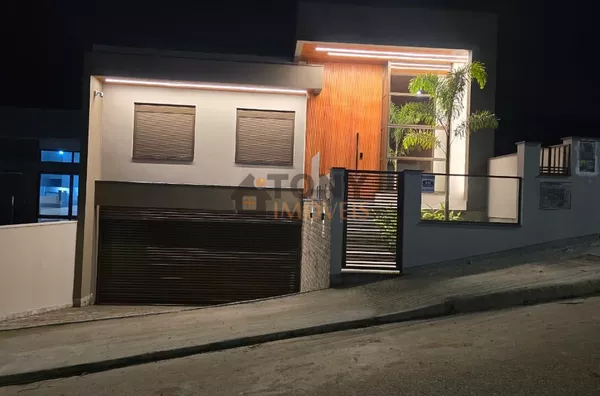 Luxuosa casa de 3 dormitórios sendo 1 suíte com 4 vagas de garagem - localizado no bairro Potecas - São José - SC - Foto 17