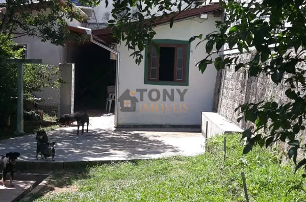 casa de madeira + terreno com 385 m² 