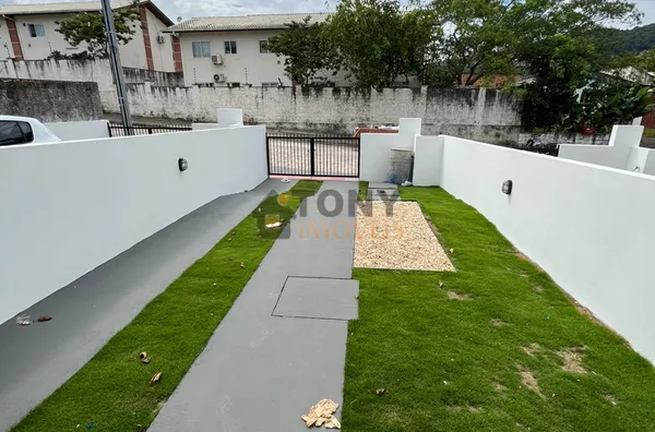 SOBRADO DE 2 SUÍTES +LAVABO E SOBRA DE TERRENO NOS FUNDOS - Foto 2