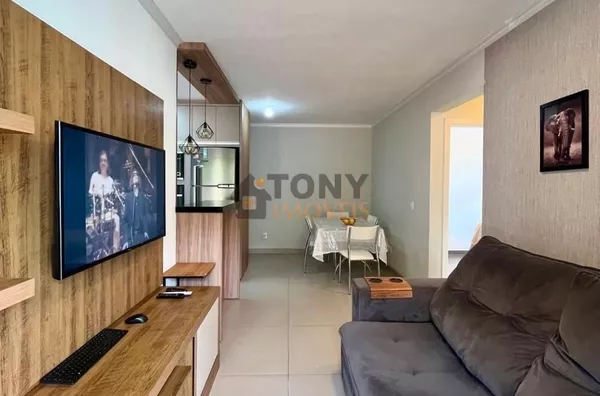 Apartamento de 2 dormitórios semi - mobiliado com 2 vagas de garagem, localizado no Bairro Ipiranga - São José - SC.
