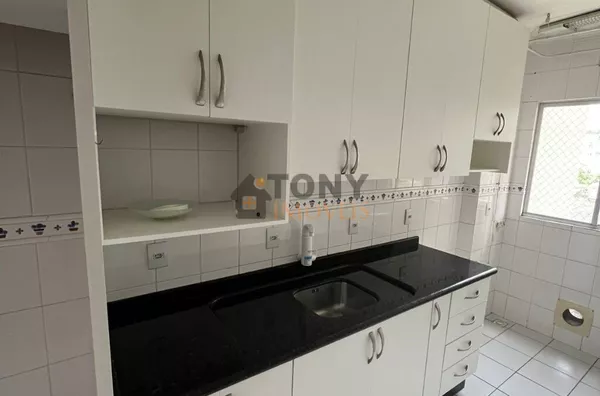 dois dormitórios com guarda roupas cozinha planejada