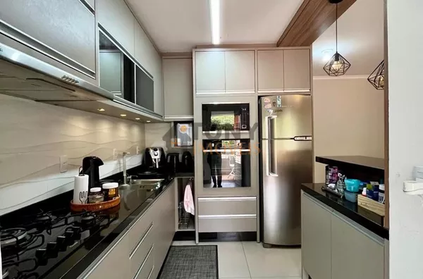 Apartamento de 2 dormitórios semi - mobiliado com 2 vagas de garagem, localizado no Bairro Ipiranga - São José - SC.