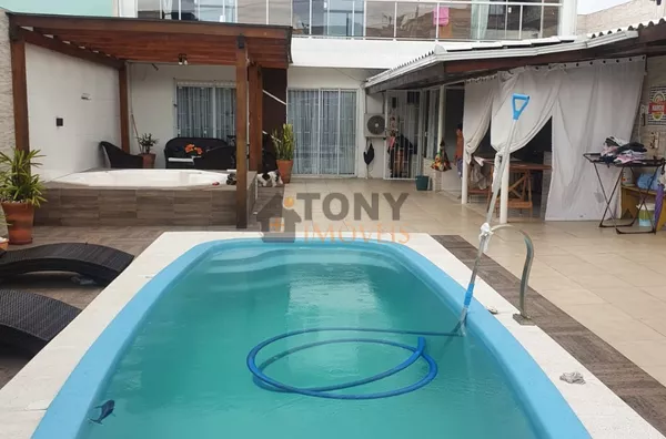 Excelente casa com piscina, jacuzzi, 3 dorm. 4 vagas -ACEITA PERMUTA - Foto 7