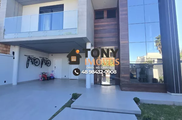 Casa imponente com 3 dormitórios, todos com suíte e closet, e uma área gourmet de tirar o fôlego espera por você no bairro Deltaville - Biguaçú-SC