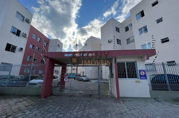 Apartamento de dois dormitórios com vaga de estacionamento