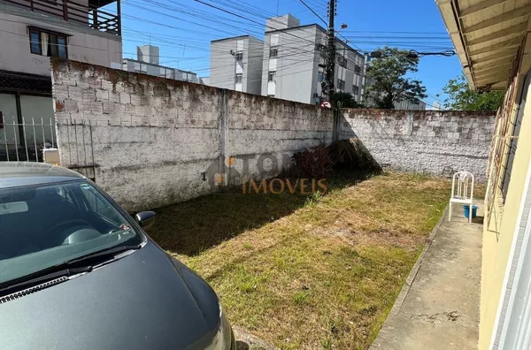 CASA COM 130 M² TERRENO COM 409 M²