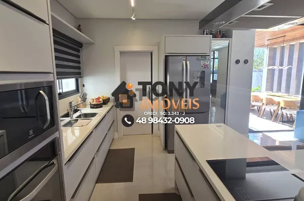 Casa imponente com 3 dormitórios, todos com suíte e closet, e uma área gourmet de tirar o fôlego espera por você no bairro Deltaville - Biguaçú-SC - Foto 8
