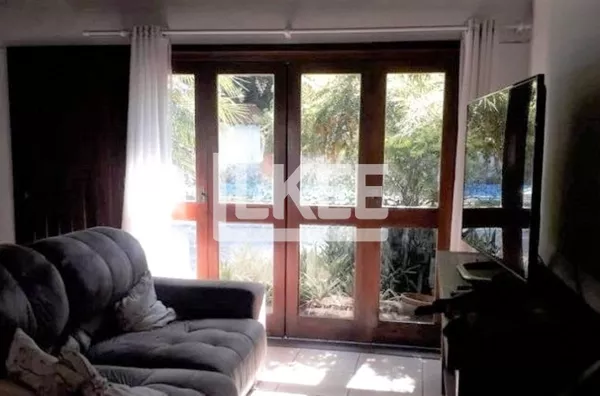 Ipanema | Casa em condominio com 4 quartos (sendo 2 suítes) à venda | 220 m² | 2 vagas | Com lareira, sacada e churrasqueira | Em Porto Alegre/RS