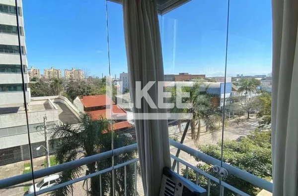 Santa Maria Goretti | Apartamento semi mobiliado com 2 quartos (sendo 1 suíte) à venda | 62 m² | 1 vaga | Com sacada e churrasqueira | Em Porto Alegre/RS