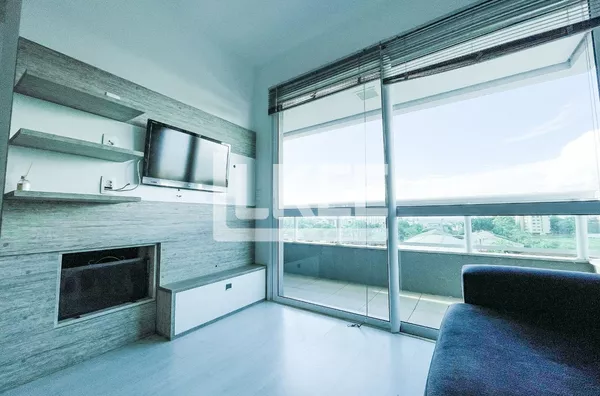 Três Figueiras | Apartamento mobiliado e equipado com 1 suíte à venda | 57 m² | 1 vaga | Com sacada, lareira e churrasqueira Em Porto Alegre/RS | std