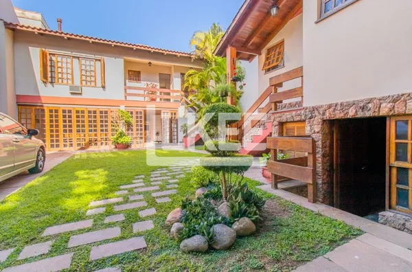 Menino deus | Casa com 5 quartos (2 suítes) para venda | 383 m² | 3 vagas | Com churrasqueira e lareira |  Em Porto Alegre/RS