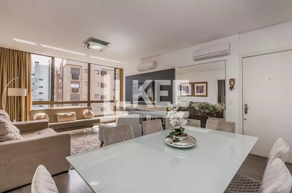 Auxiliadora | Apartamento semi mobiliado com 3 quartos (sendo 1 suíte) à venda | 88,69 m² | 2 vagas | Com sacada e churrasqueira | Em Porto Alegre/RS