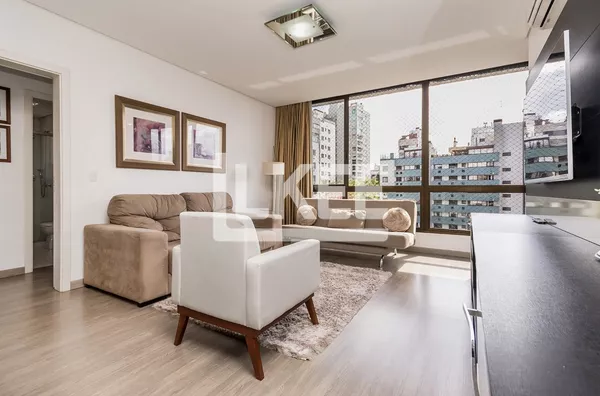Auxiliadora | Apartamento semi mobiliado com 3 quartos (sendo 1 suíte) à venda | 88,69 m² | 2 vagas | Com sacada e churrasqueira | Em Porto Alegre/RS