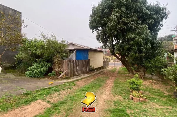Terreno com 2 casas no pátio gerando Renda na Vila João Pessoa – Porto Alegre
