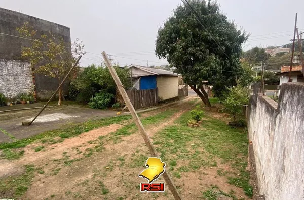Terreno com 2 casas no pátio gerando Renda na Vila João Pessoa – Porto Alegre