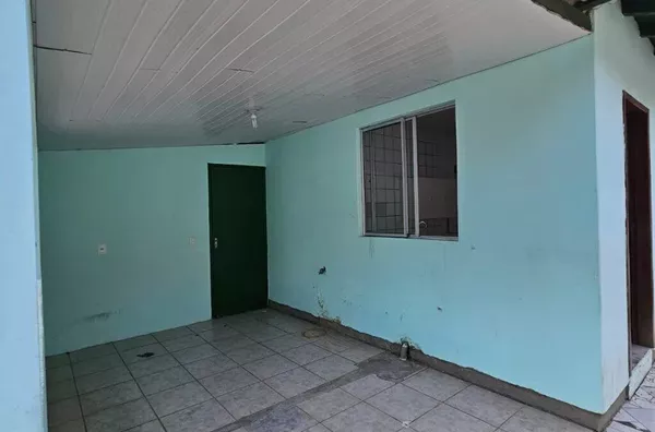 Casa com 2 Quartos e Quintal Escriturado na Praia de Palmas – Excelente Localização!