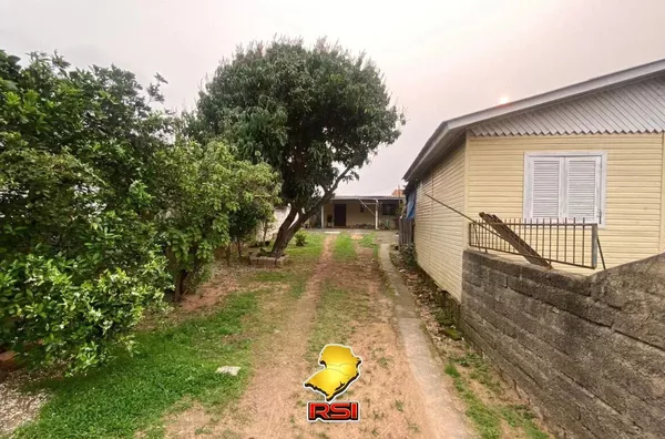 Terreno com 2 casas no pátio gerando Renda na Vila João Pessoa – Porto Alegre