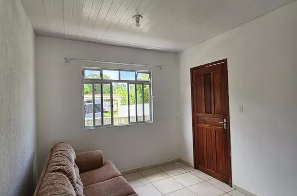 Casa com 2 Quartos e Quintal Escriturado na Praia de Palmas – Excelente Localização!