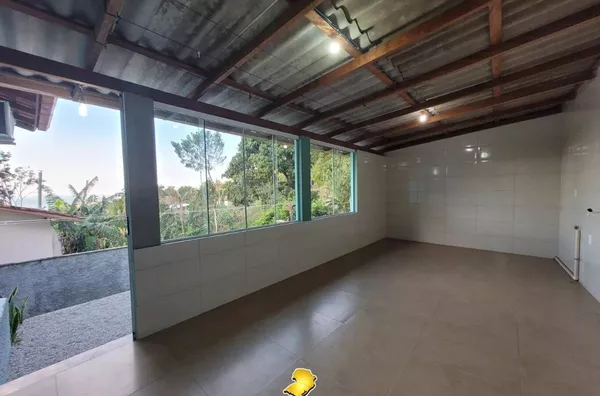 Casa com 2 Quartos e Quintal Escriturado na Praia de Palmas – Excelente Localização!