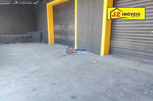 PRÉDIO COM APARTAMENTOS E COMÉCIO EM ARAÇARIGUAMA