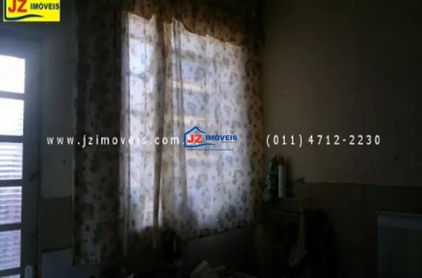 CASA TERREA EM CENTRO