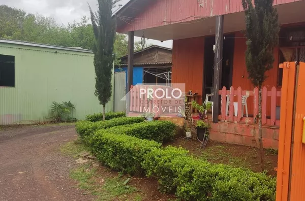 TERRENO COM 1000M², NO SANTA ROSA COM 02 CASAS E UM BARRAÇAO.