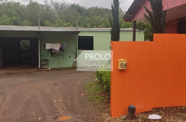 TERRENO COM 1000M², NO SANTA ROSA COM 02 CASAS E UM BARRAÇAO.