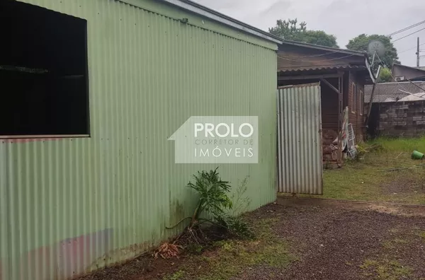 TERRENO COM 1000M², NO SANTA ROSA COM 02 CASAS E UM BARRAÇAO.