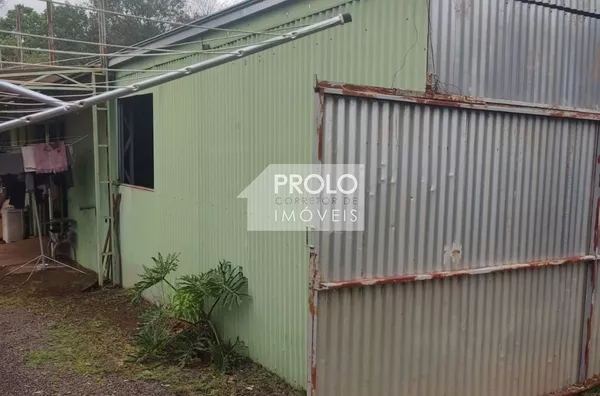 TERRENO COM 1000M², NO SANTA ROSA COM 02 CASAS E UM BARRAÇAO.