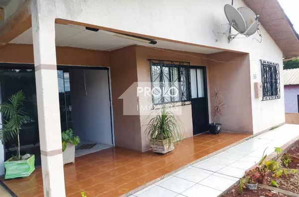 CASA COM ÓTIMA SOBRA DE LOTE, EM MARMELEIRO.