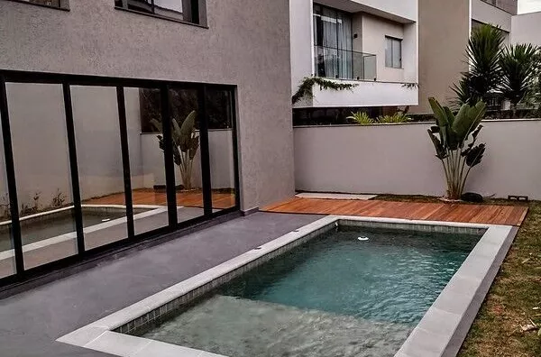 ALPHAVILLE 2 - Casa À Venda com 4 Suítes, Cozinha Gourmet e Piscina