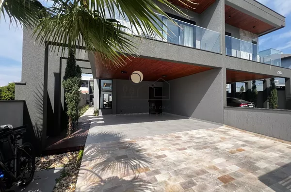 casa de alto padrão com 03 dormitórios sendo 01 Suíte Master,  onde cada detalhe foi planejado para oferecer sofisticação, conforto e bem-estar. Praia dos Ingleses - Foto 1