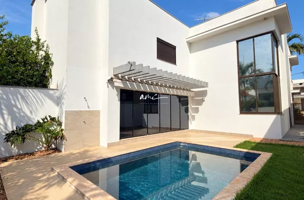 Sobrado de 403 m², com 4 dormitórios, piscina aquecida e living com pé-direito duplo à venda no Condomínio Florais Cuiabá – Cuiabá/MT - Foto 1