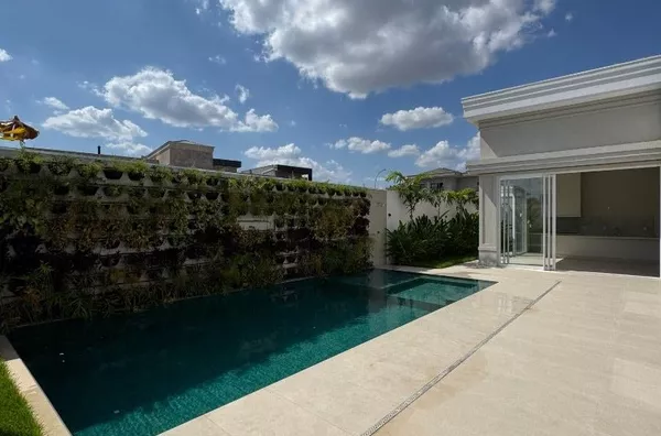 Casa térrea de 349 m² com energia solar e sistema de automação completo, à veda no condomínio Supremo Itália - Cuiabá/MT