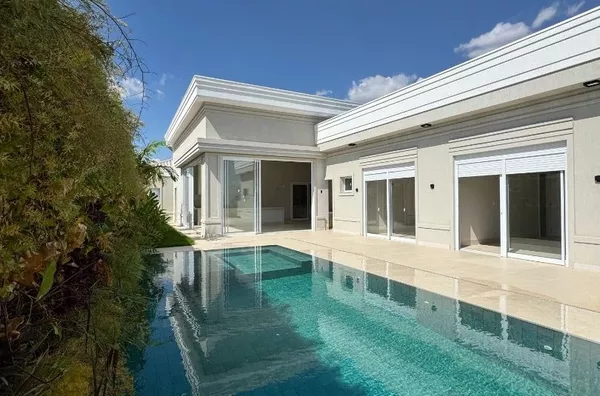 Casa térrea de 349 m² com energia solar e sistema de automação completo, à veda no condomínio Supremo Itália - Cuiabá/MT