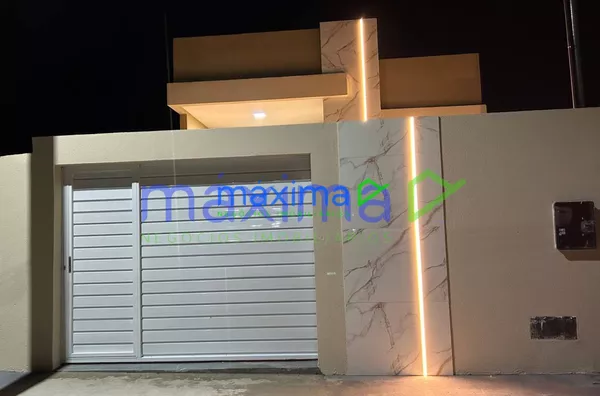 Linda casa com 2/4 sendo 1 suíte - Foto 1