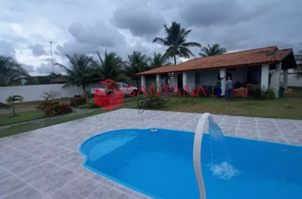 Casa com 4/4 em Arembepe