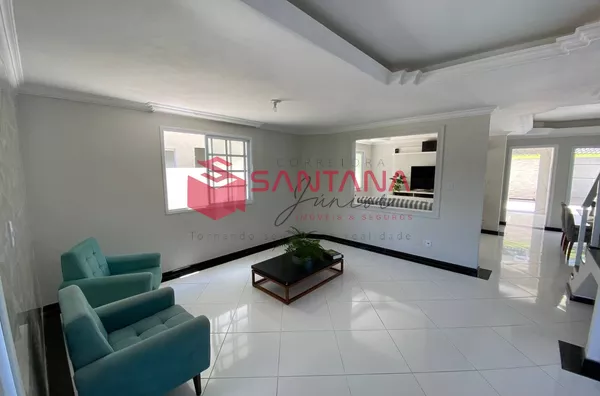 Casa em condomínio com 4/4 com área externa á venda em Camaçari