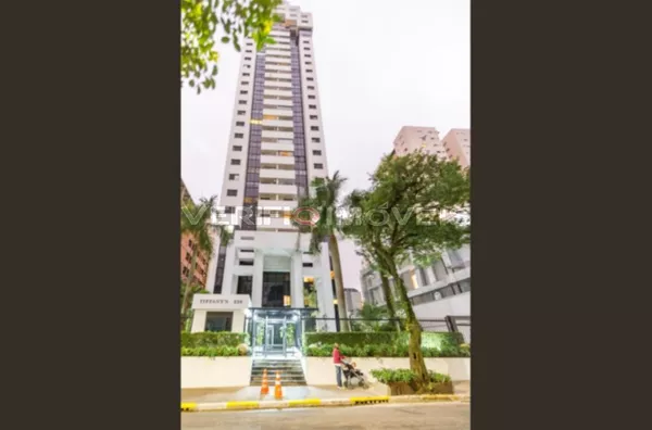 APARTAMENTO no 25º andar mobiliado com 1 dormitório e 2 garagens