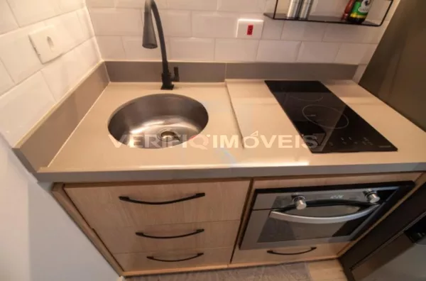STUDIO no 13º andar mobiliado com 1 dormitório e 1 garagem