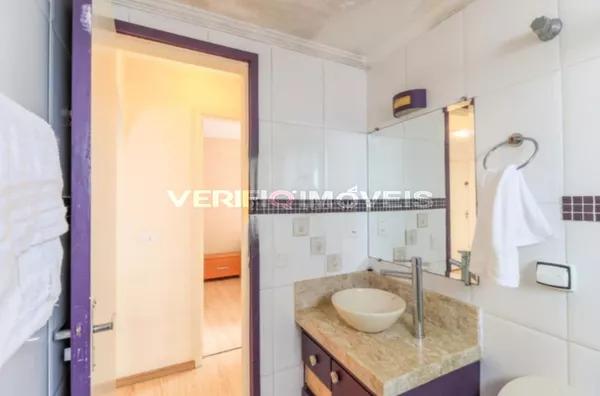 APARTAMENTO no 1º andar mobiliado com 2 dormitórios e 1 garagem