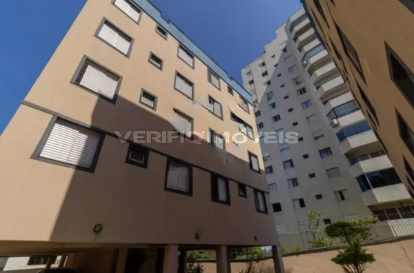 APARTAMENTO no 4º andar mobiliado com 2 dormitórios e 1 garagem