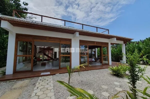 Casa moderna, com 4 suítes, à venda na praia de Itamambuca - Foto 1