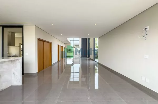 Sobrado de Alto Padrão em Condomínio Fechado projeto Moderno Arq. Fábio Martins com terreno de 365m² e 310m² de construção.