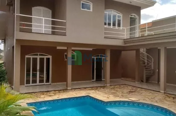 Lindo Sobrado no Bairro da Ribeirânia com 4 dormitórios, piscina e varanda gourmet, 359m² de área útil.