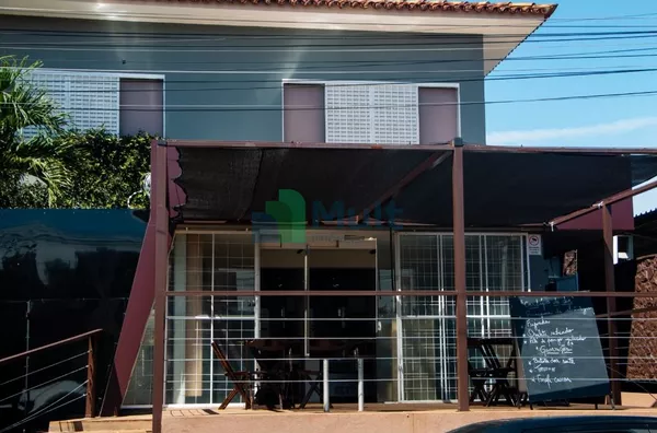 Casa com 4 dormitórios, 432 m² - venda por R$ 1.300.000,00 ou aluguel por R$ 7.085,18/mês - Jardim Sumaré - Ribeirão Preto/SP