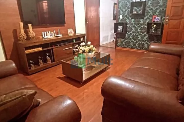 Casa localizada no Bairro Parque Ribeirão com terreno de 165m² e 125,5m² de área construída