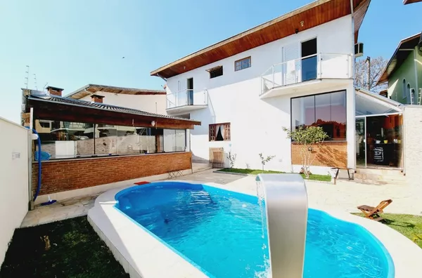 Casa com 4 quartos sendo 1 suíte - 290m² - Foto 1
