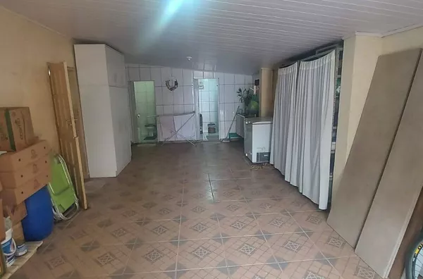 VENDE UMA CASA NO BAIRRO PEREQUE PORTO BELO SC
