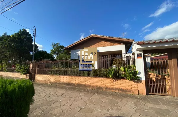 Terreno de esquina com casa no Bairro São Jacó